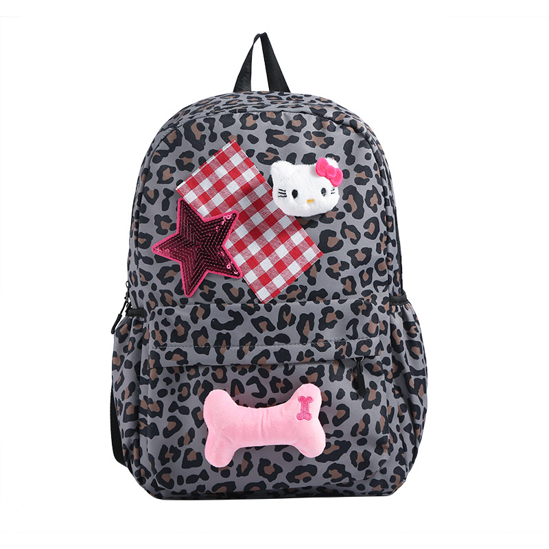 A cute Korean-style schoolbag with a niche design, featuring cartoon leopard print and a large capacity backpack for high school and college students Item Picture
