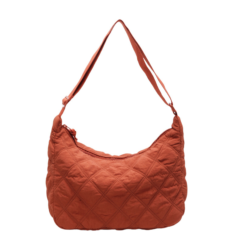 The new cotton-padded jacket bag for autumn and winter features a large-capacity diamond-shaped embroidered thread single-shoulder bag that is fashionable and versatile. It also comes with a cotton and nylon bag and a crossbody bag Item Picture