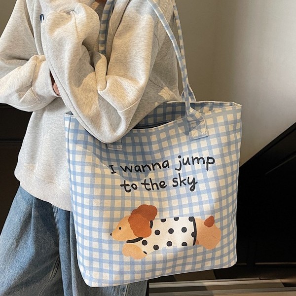 A new Japanese-style cartoon canvas bag, a student hand-held cartoon dog tote bag, and a portable handbag with a check pattern for girls details Picture
