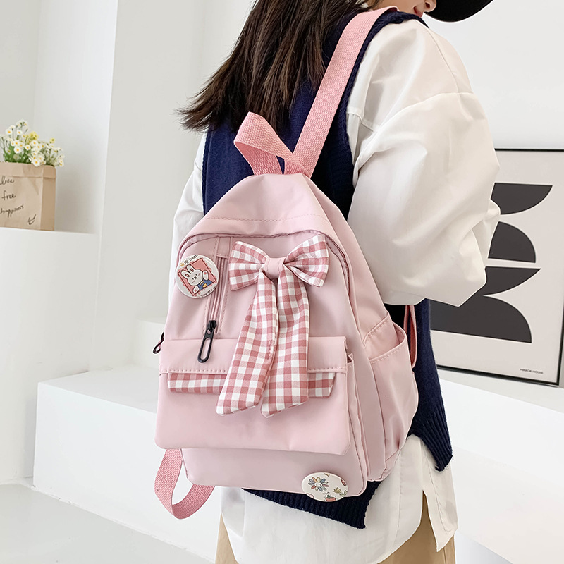 Bowknot schoolbag for female primary school students, large-capacity, lightweight, lightweight, cute and simple backpack for junior high school students from grades three to six Specification drawing