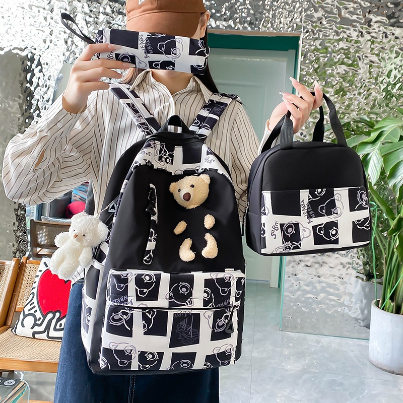 New large-capacity schoolbag for primary and secondary school students, cute little bear backpack for girls, lunch box, three-piece set, travel backpack for cross-border details Picture