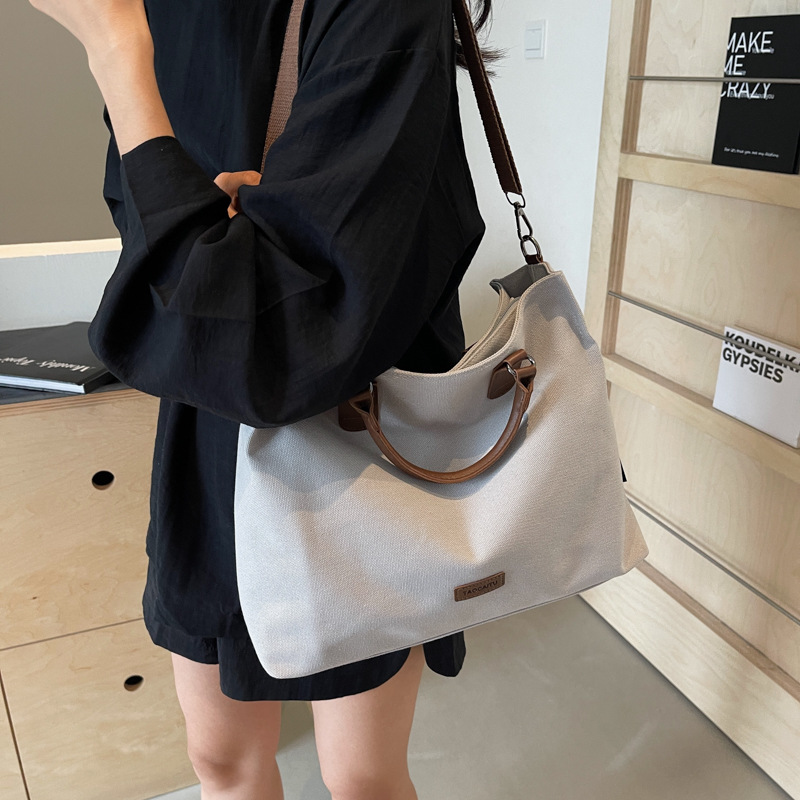 Casual canvas bag for women, 2024 new style, college student commuting tote bag, large capacity crossbody handbag details Picture