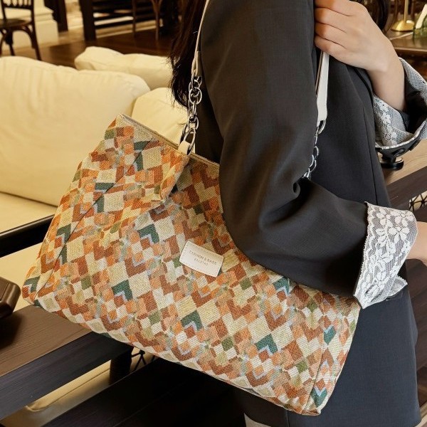 A simple and high-quality large-capacity bag for women, a new summer niche fashion bucket bag for women in 2025, a casual and versatile crossbody bag full figure