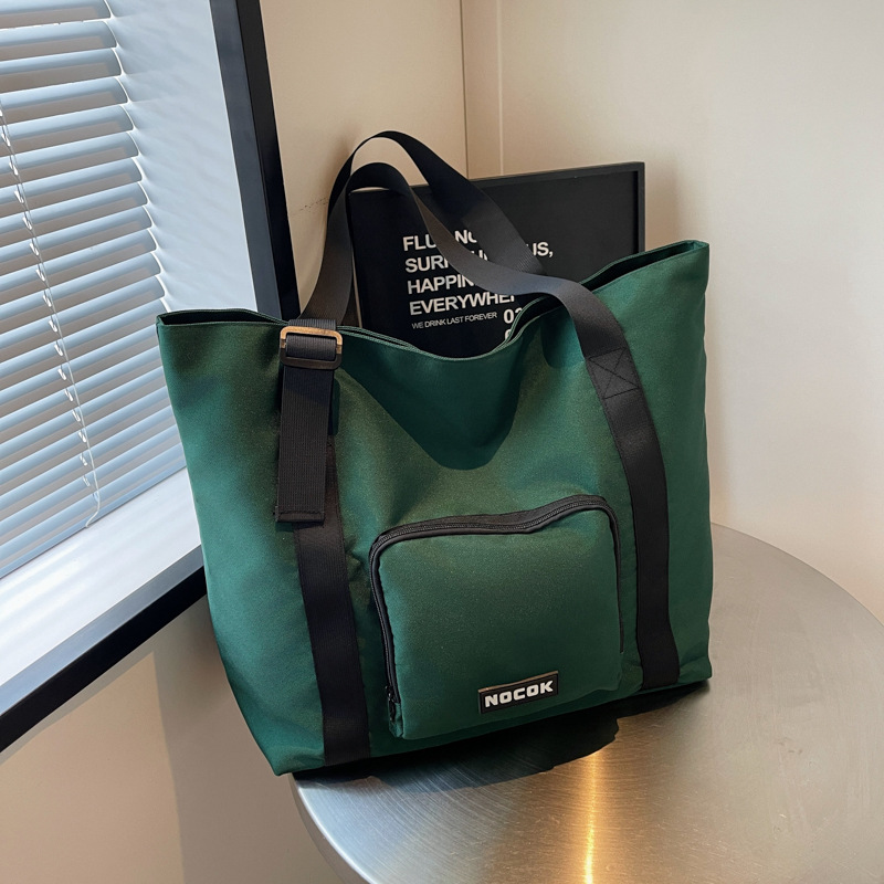 Wholesale large-capacity fashionable fitness bags, lightweight and casual short travel bags, women's foldable boarding hand shoulder bags full figure