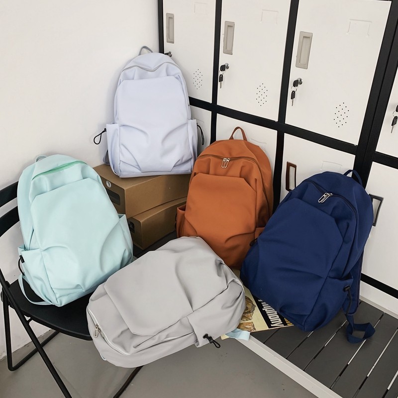 Multi-functional solid-color casual backpack for male and female college students, simple large-capacity backpack, laptop bag details Picture