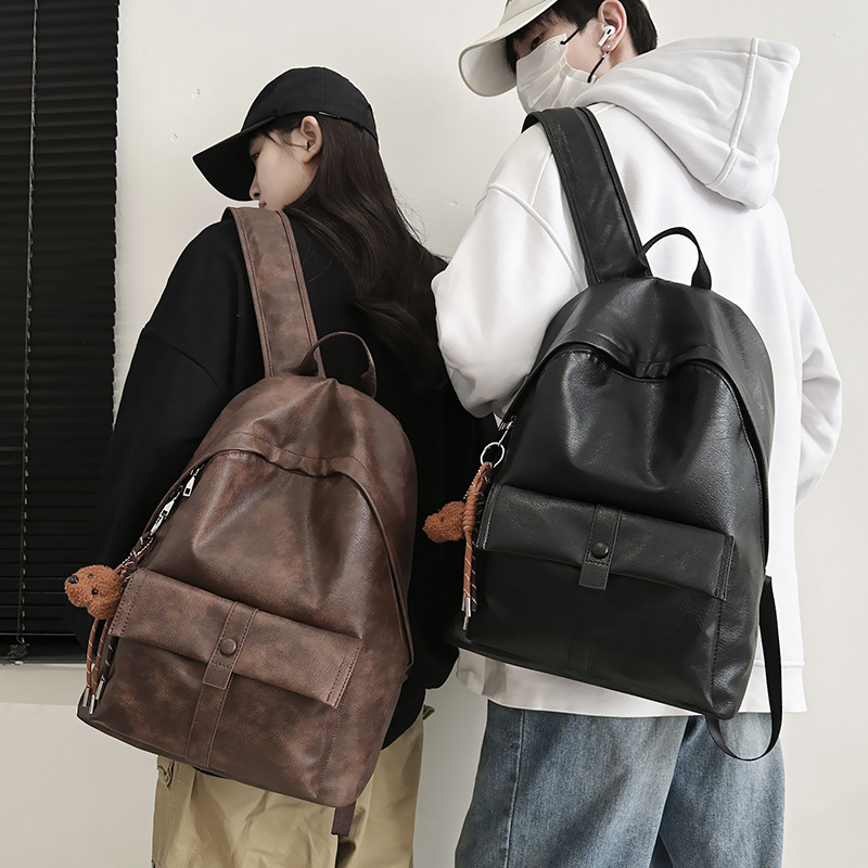 Hong Kong-style retro backpack for autumn and winter, new simple PU large-capacity student schoolbag, versatile travel and leisure backpack full figure