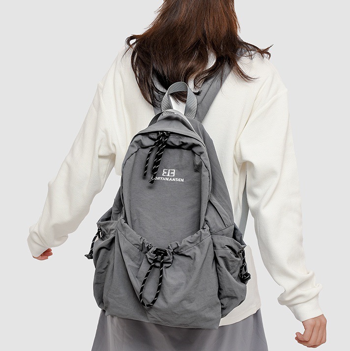 Travel backpack, lightweight college student schoolbag, junior high school girl, Korean-style laid-back style, casual and versatile student backpack full figure