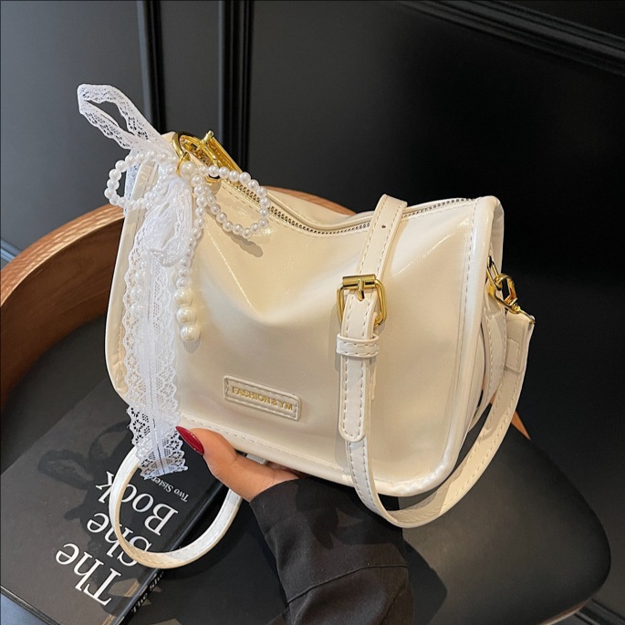 The 2025 new stylish lace bow hand-held pillow bag is a high-end, fashionable and versatile single-shoulder crossbody bag for women full figure