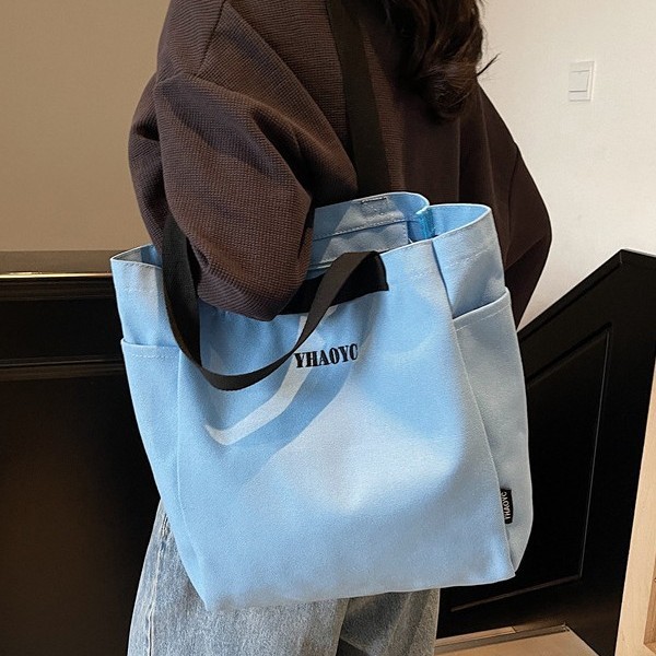 Popular new canvas bags for women's commuting to work, large-capacity single-shoulder bags, simple tote bags, and hand-held canvas bags for classes details Picture