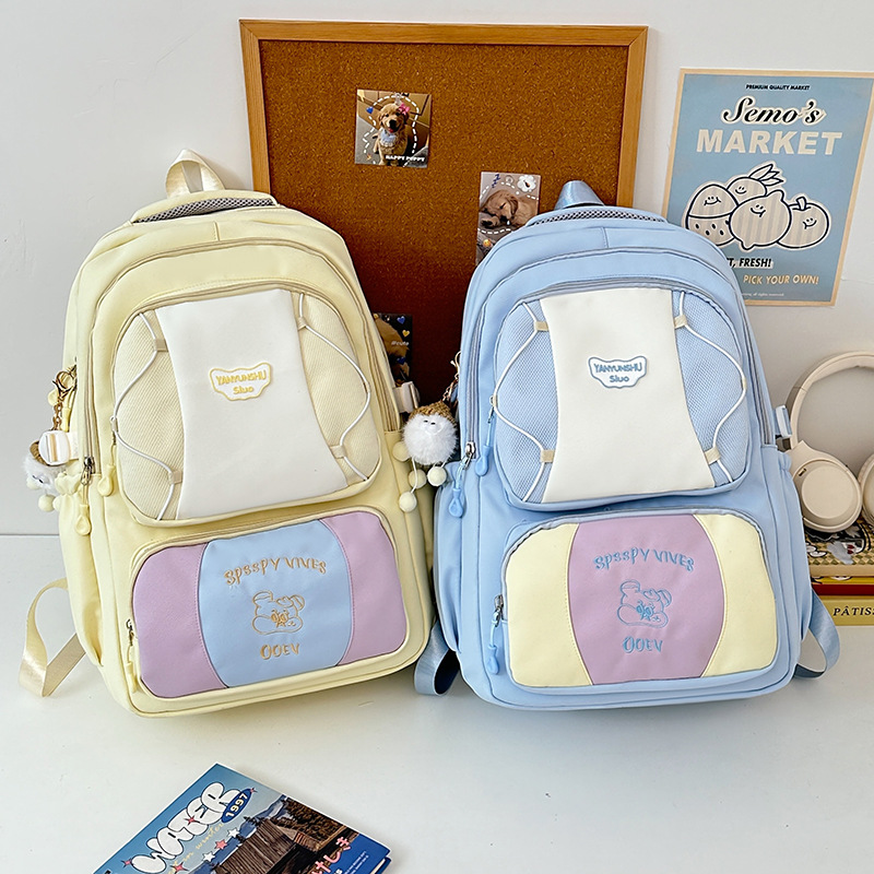New large-capacity backpack, college-style casual travel bag, fashionable study bag for junior and senior high school students, and college student schoolbag full figure