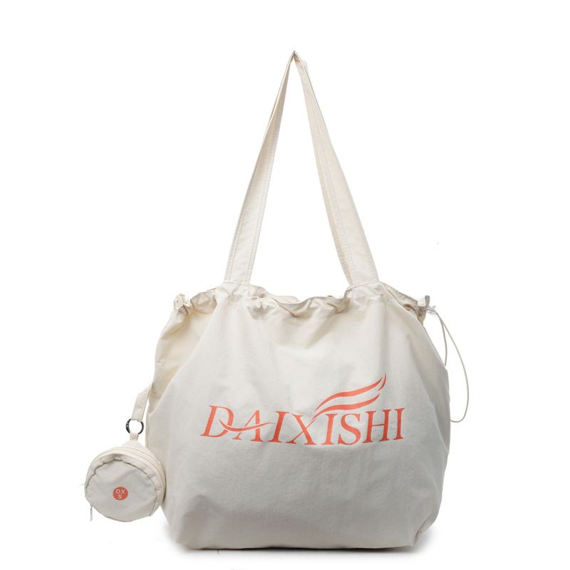 A laid-back summer large-capacity commuter high-end tote bag for women 2025, a new mother-and-child single-shoulder handbag Item Picture