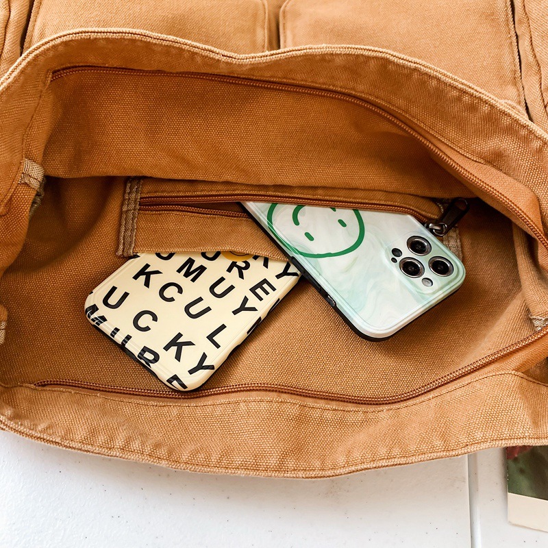 A new Japanese-style retro canvas bag for women, a large-capacity crossbody bag with a workwear style, and a Korean-style fashionable single-shoulder bag for female college students Application Scenario