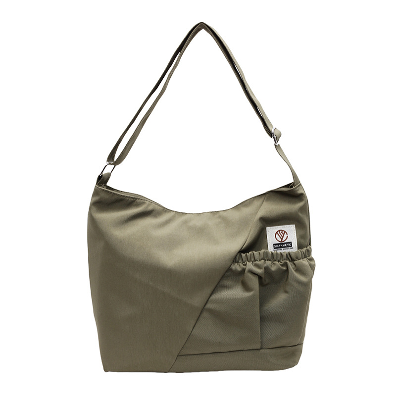 A niche design 2025 new dumpling bag, a versatile and fashionable single-shoulder bag for commuting, and a high-end quality crossbody canvas bag Item Picture