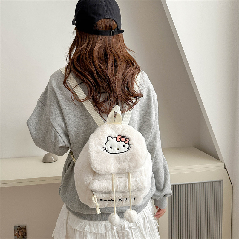 A new cartoon embroidered shoulder plush backpack with large capacity, a soft girl's niche flip cover backpack, and a girlish class bag Specification drawing