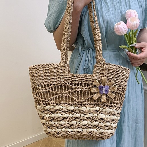 Large-capacity women's 2025 new style fashionable woven straw bag, summer hand-carry bag for seaside vacation full figure
