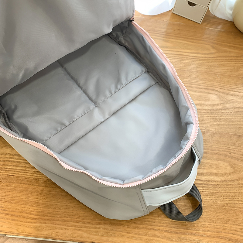 Korean sweet and cool schoolbag for female college students, a niche design with high appearance standards, a lightweight travel backpack for girls in high school Application Scenario