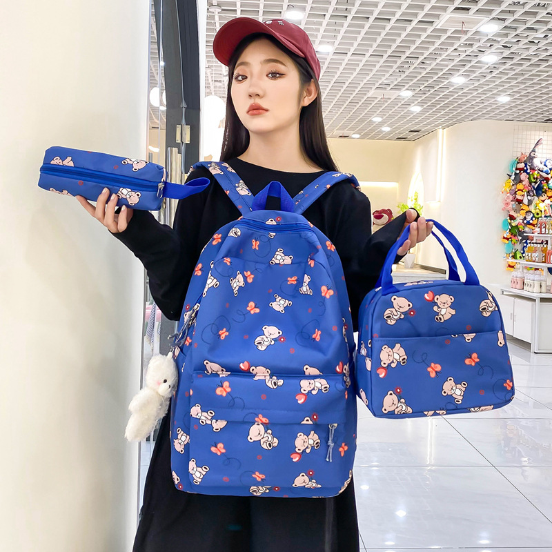 Cute cartoon-printed backpack for girls, large-capacity junior and senior high school backpack, three-piece set, insulated lunch bag details Picture