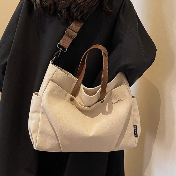 New large-capacity single-shoulder bag from Japan and South Korea, canvas women's bag, fashionable and trendy crossbody tote bag for women's commuting and college students full figure