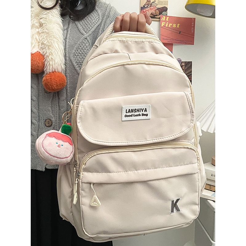The new casual backpack is versatile for both male and female high school and college students. It is a large-capacity, fashionable, solid-color backpack in Korean style Application Scenario