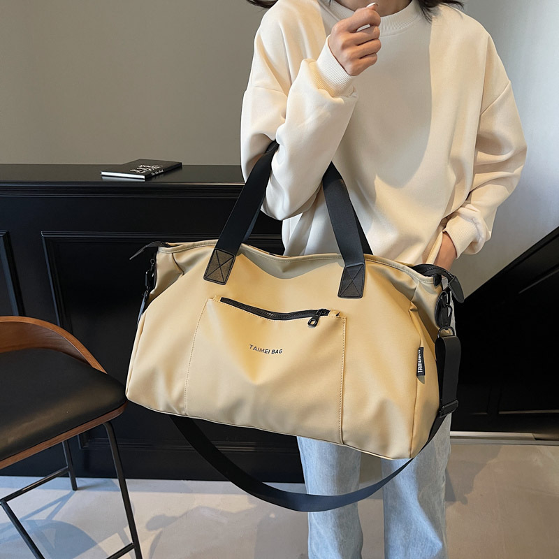 New dry-wet separation travel bag, large-capacity, fashionable and cool hand-held luggage bag, men's and women's swimming and fitness sports bag details Picture