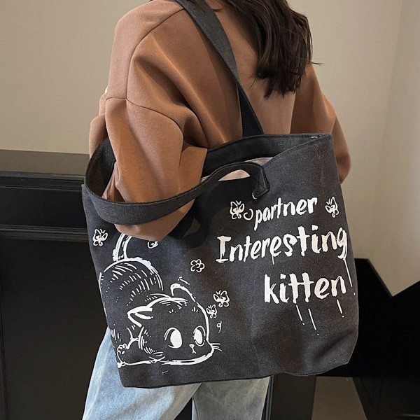 New Korean version of ins women's large-capacity canvas bag, casual cartoon shopping bag, commuting tote bag details Picture