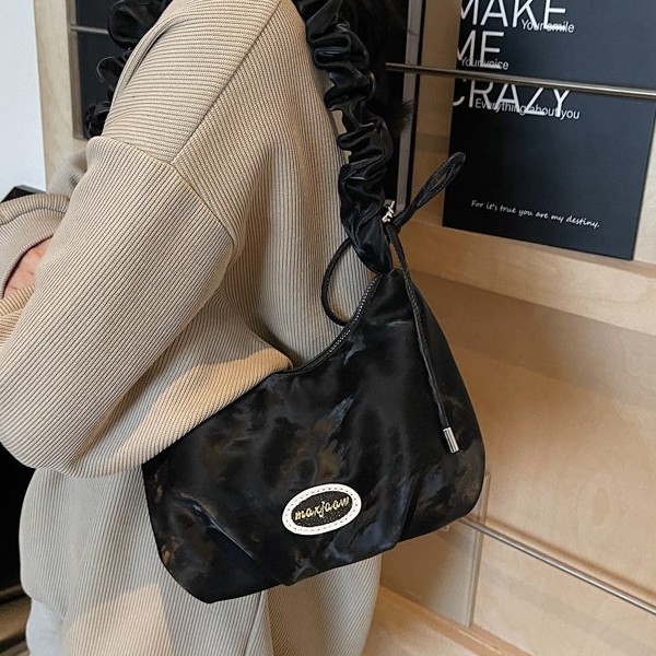 Korean hand-held bucket bag 2025 new spring versatile, high-end and fashionable single-shoulder bag, niche design crossbody bag Specification drawing