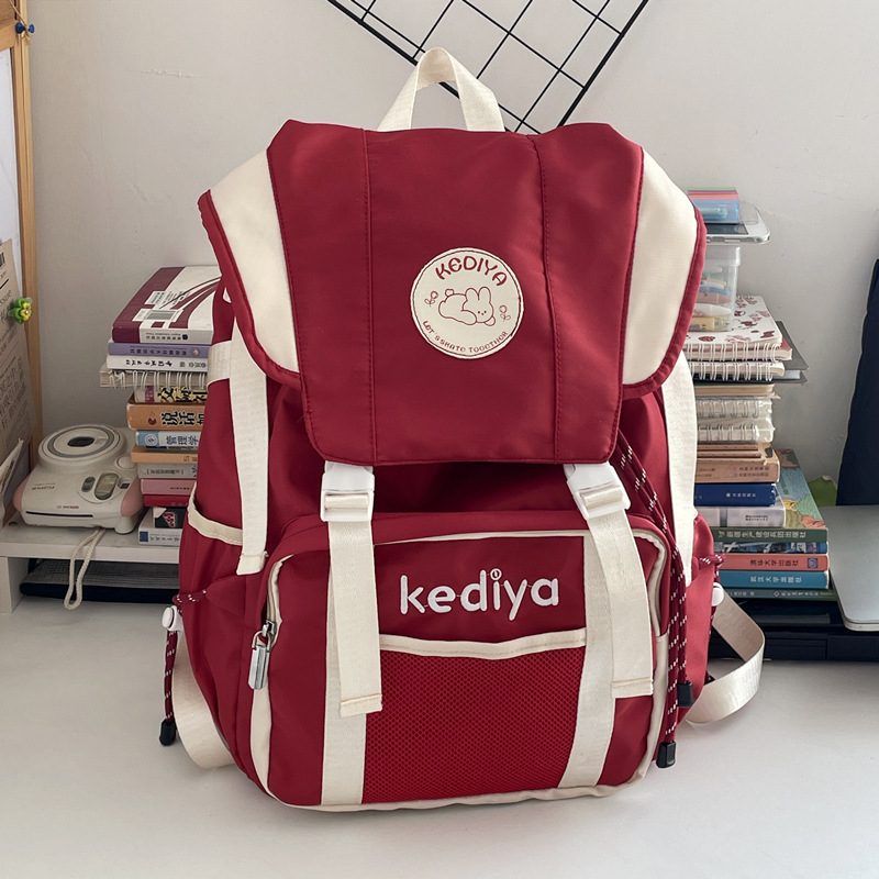 Japanese-style large-capacity student backpack with contrasting color design, casual outdoor sports bag, unisex backpack full figure