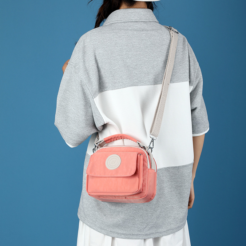 New cross-border women's fashion and trend crossbody bag, Japanese style simple water repellent bag, lipstick, loose change portable handbag details Picture