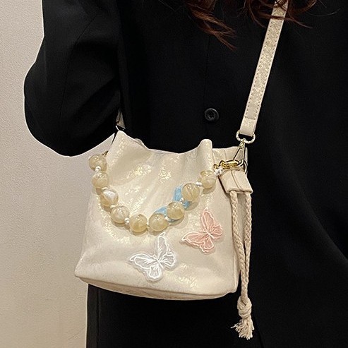 2025 New large-capacity women's bag for spring and summer, cute hand-held, underarm, single-shoulder bag, high-end and versatile tote bag details Picture