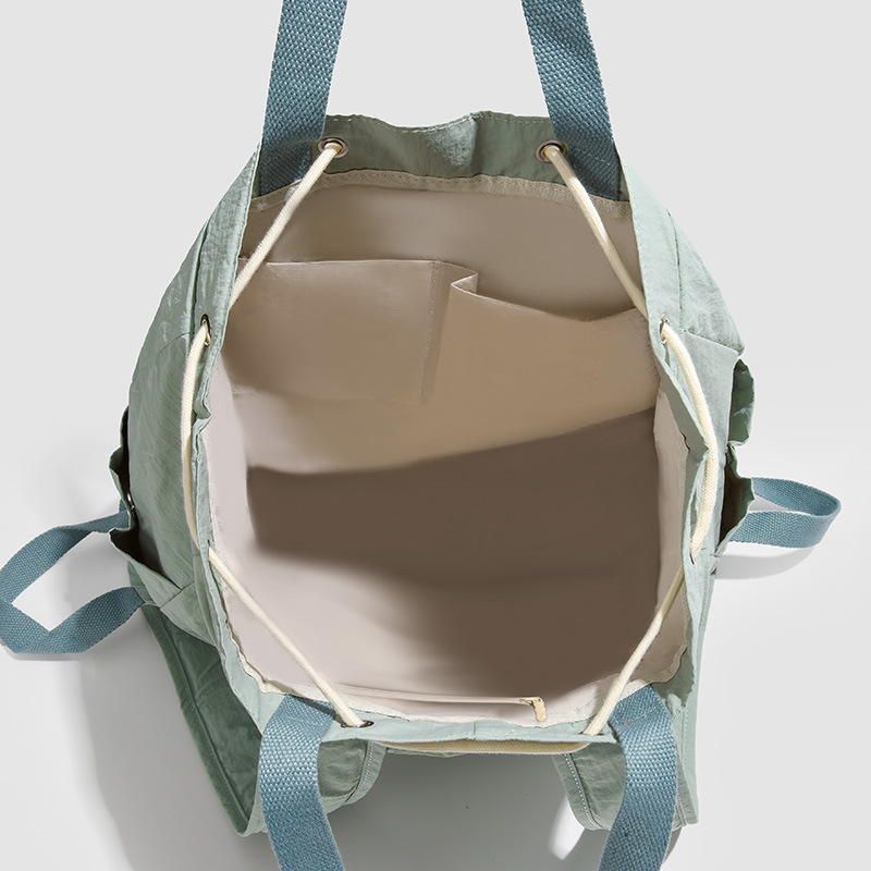 A versatile and fashionable drawstring backpack for women, a new 2024 niche casual Instagram simple commuting bag, a lightweight small bag Application Scenario