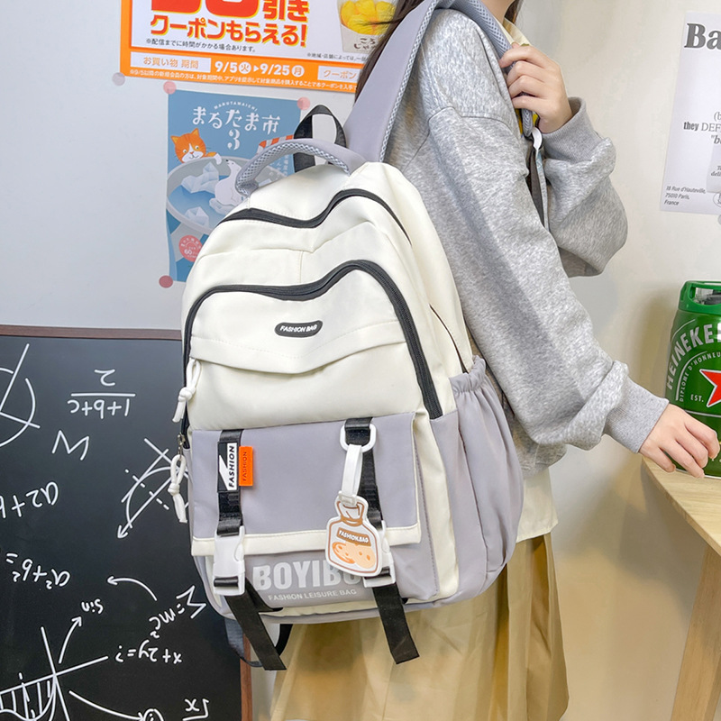 2024 New fashionable and trendy computer bag with contrasting colors, large-capacity backpack, student schoolbag, women's Korean version lightweight backpack details Picture