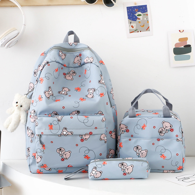 Cute cartoon-printed backpack for girls, large-capacity junior and senior high school backpack, three-piece set, insulated lunch bag Application Scenario