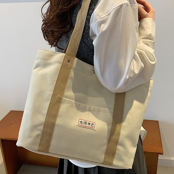 This is a new large-capacity Korean-style bag for autumn and winter fashion. It's perfect for casual commuting and is suitable for students' classes. It also comes with a single-shoulder backpack Specification drawing