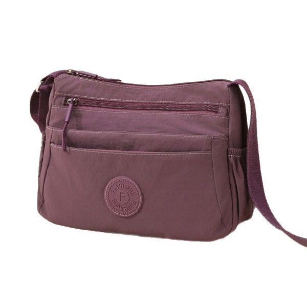 A new multi-layered casual and lightweight single-shoulder crossbody bag for women, a fashionable and simple commuting casual bag for mothers, and a storage bag Item Picture