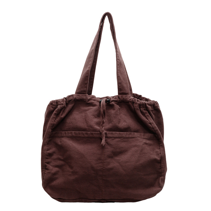 2025 New solid color, large capacity, niche design, fashionable and versatile single-shoulder bag, handbag, drawstring, class bag Item Picture
