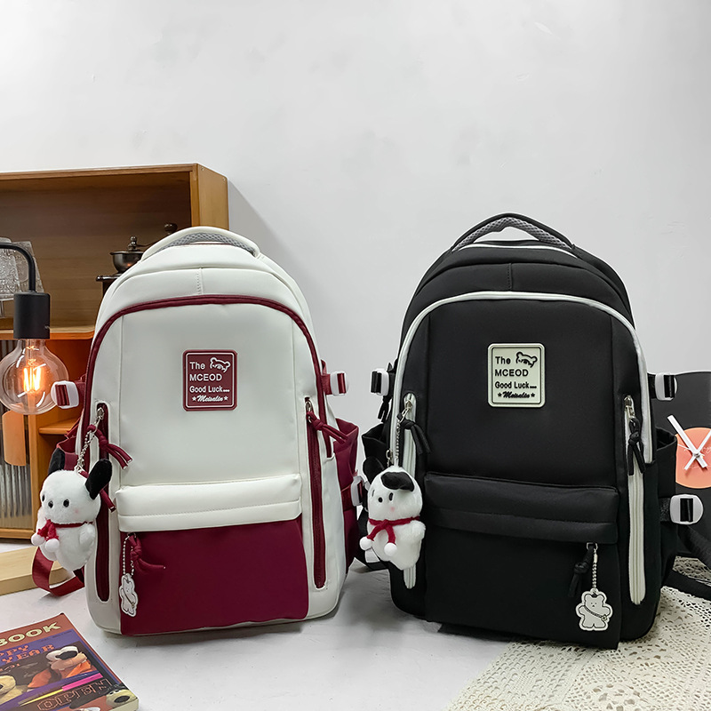 A new cross-border large-capacity schoolbag for primary and secondary school students, a light and simple travel backpack in contrasting colors for girls in grades three to six details Picture