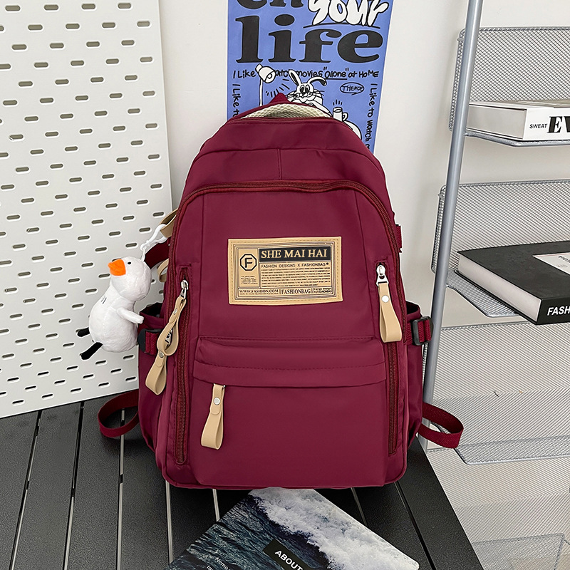 Spring outing backpack with high appearance level, new schoolbag, lightweight for high school and junior high school students, large-capacity travel and study bag for girls details Picture