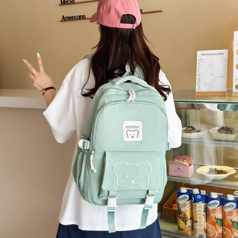 New cross-border Korean version travel large-capacity backpack for girls, high school and junior high school students, high appearance level cartoon bear backpack full figure