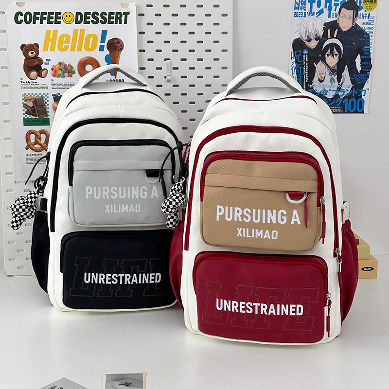 A color-blocking backpack for girls, a Korean version, a large-capacity backpack for high school students, and a versatile travel backpack for junior high school students full figure