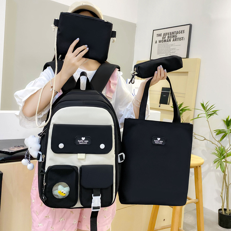 Campus four-piece set of schoolbag for junior high school students, a new Korean-style backpack with color contrast, and a large-capacity girls' backpack with reduced load details Picture