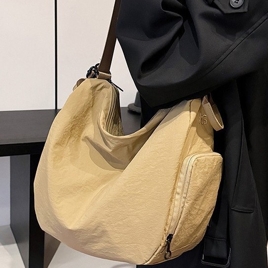 Lightweight bag for women, Spring 2025 collection: Fashionable hand-held backpack, dual-purpose single-shoulder fashionable washable fabric crossbody bag full figure