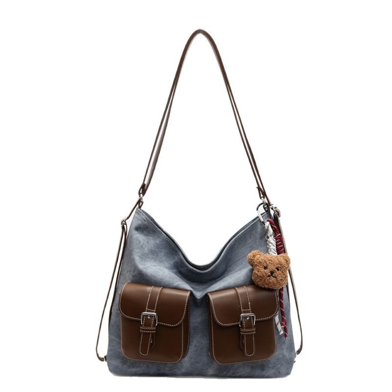 Fashionable large-capacity tote bag, simple commuter motorcycle bag for women, new spring 2025 college student class bag Item Picture