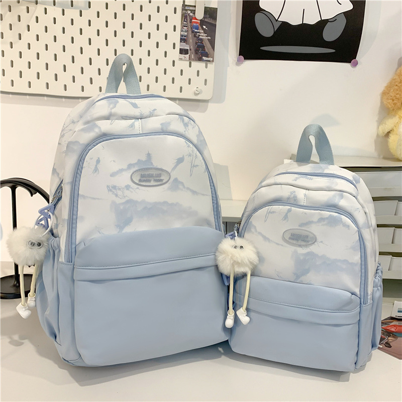 A new fashionable women's backpack for ink wash travel, a casual waterproof Oxford fabric travel bag and a schoolbag for going out full figure