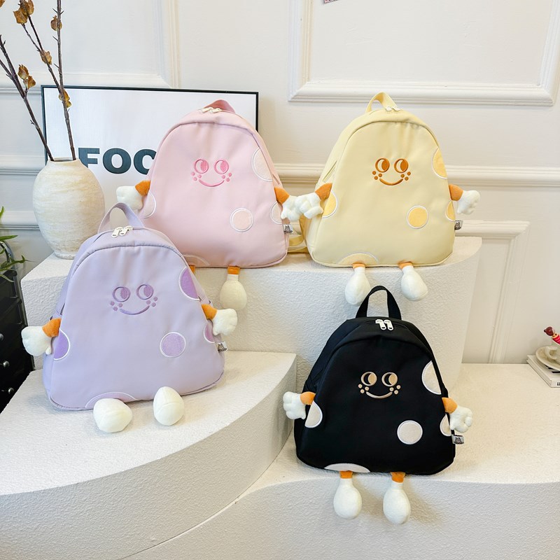 Cross-border cute children's schoolbag, baby boy and girl cheese backpack, portable and lightweight cartoon backpack for going out Application Scenario