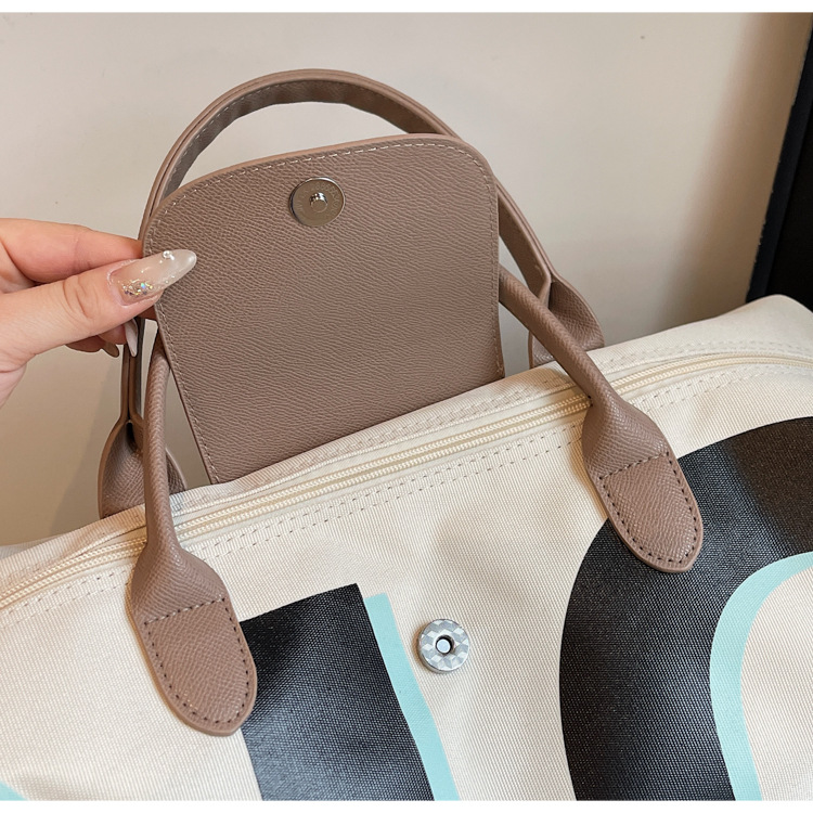 Large-capacity short travel bag for women, simple and fashionable letter handbag, women's luggage bag for going out, waterproof fitness bag details Picture