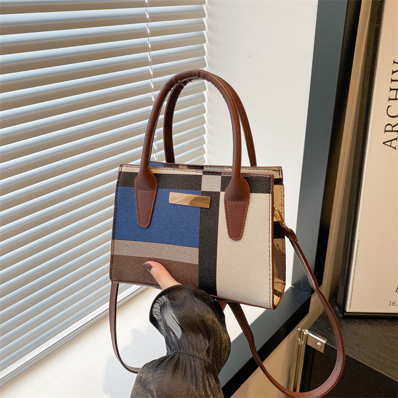The 2024 new fashionable and trendy multi-color checkered patchwork women's bag is a popular large-capacity single-shoulder handbag for women full figure