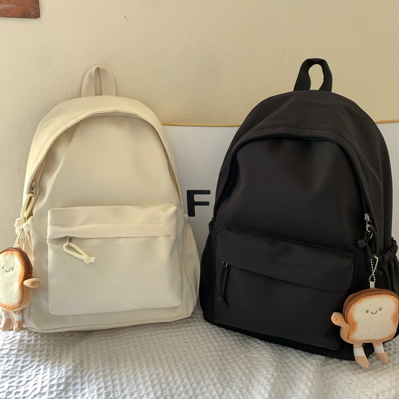 Cross-border Japanese-style campus casual solid-color schoolbag, simple large-capacity lightweight backpack, junior high school and primary school students' backpack details Picture