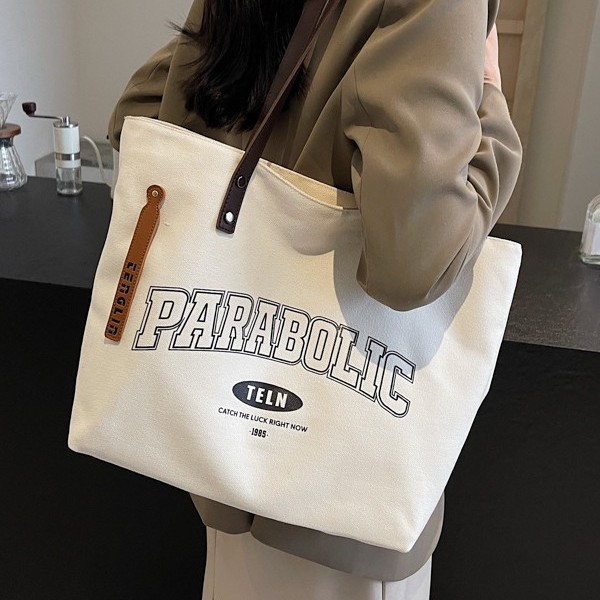 Fashionable new versatile canvas bag, color-matched mother and child handbag, large-capacity school-style single-shoulder bag, casual and laid-back style Application Scenario