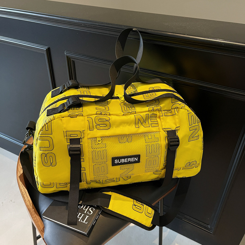 Fashionable printed large-capacity business trip luggage bag, Korean-style cool sports and fitness bag, storage bag for men and women traveling full figure