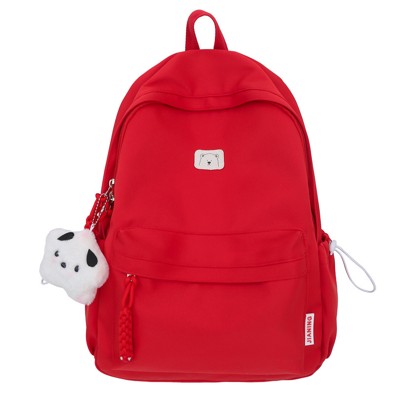 A new cross-border, niche, large-capacity, lightweight and simple Korean-style solid color large-capacity schoolbag suitable for both boys and girls in primary schools Item Picture